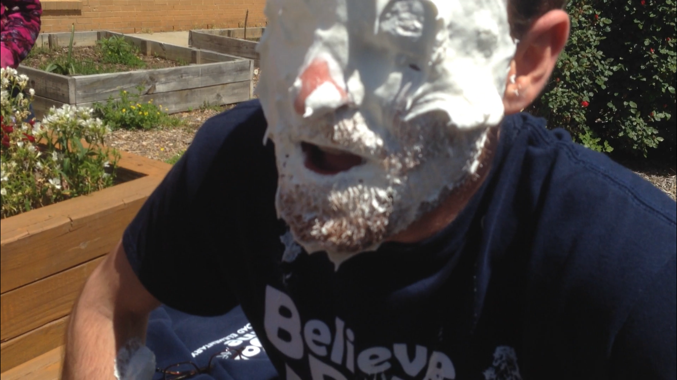 This picture is of the author after his students pied him in the face.