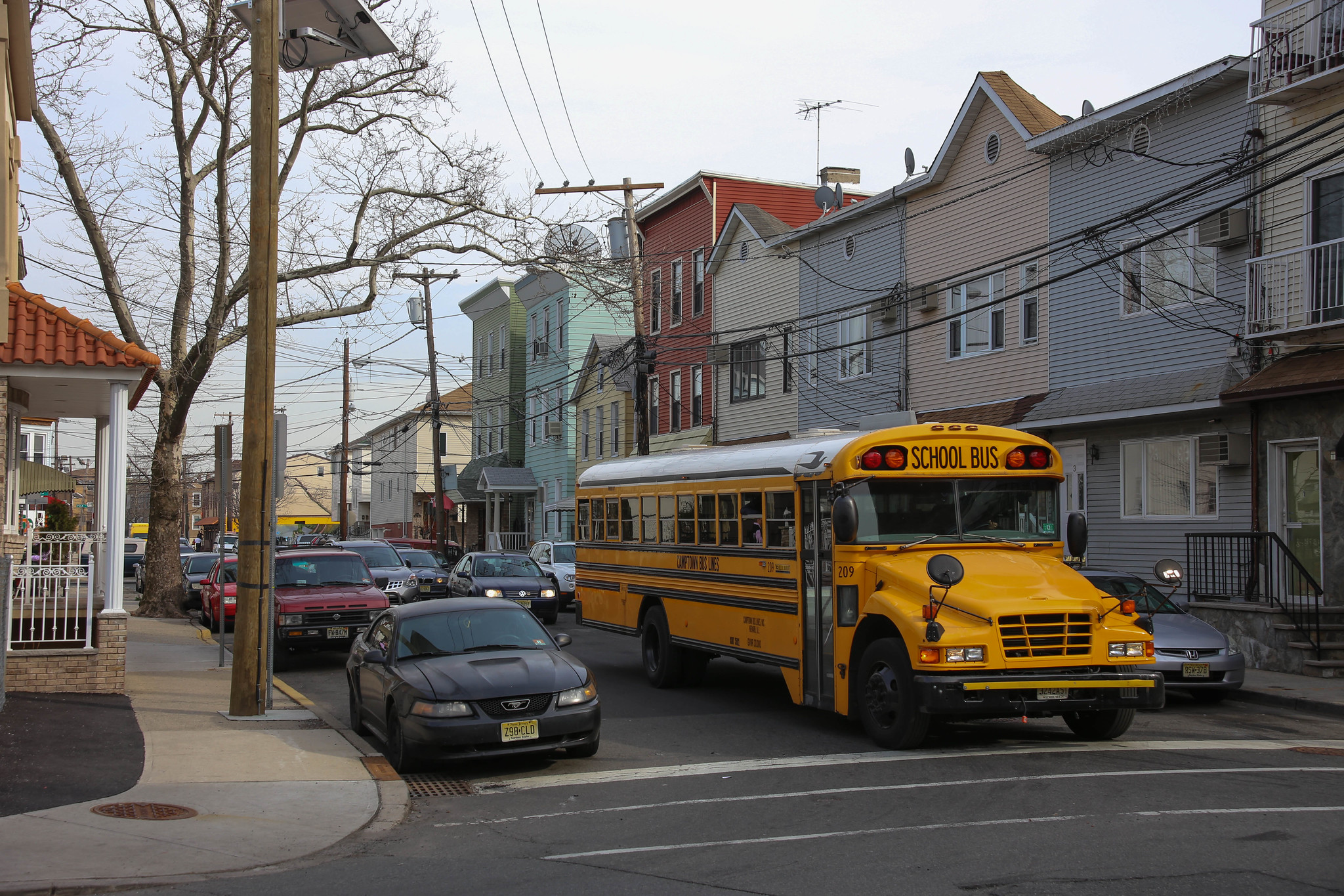 school bus driving down the street in Newark, NJ